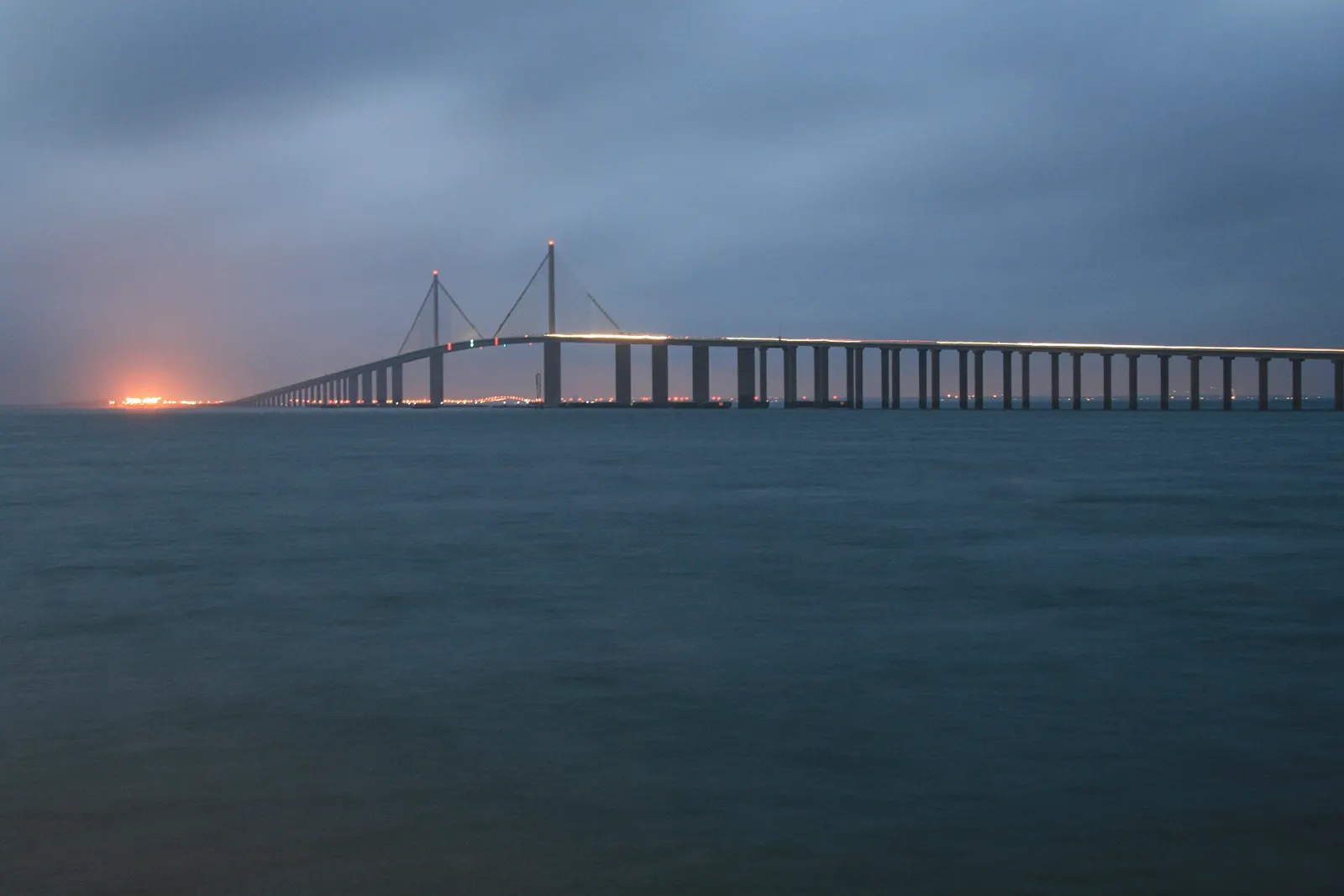 The Sunshine Skyway Bridge at dusk seen across Tampa Bay
